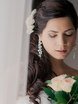 С аксессуарами / Цветами / Фатой, Локоны / Локоны на один бок от Свадебный стилист Ольга Силаева 1